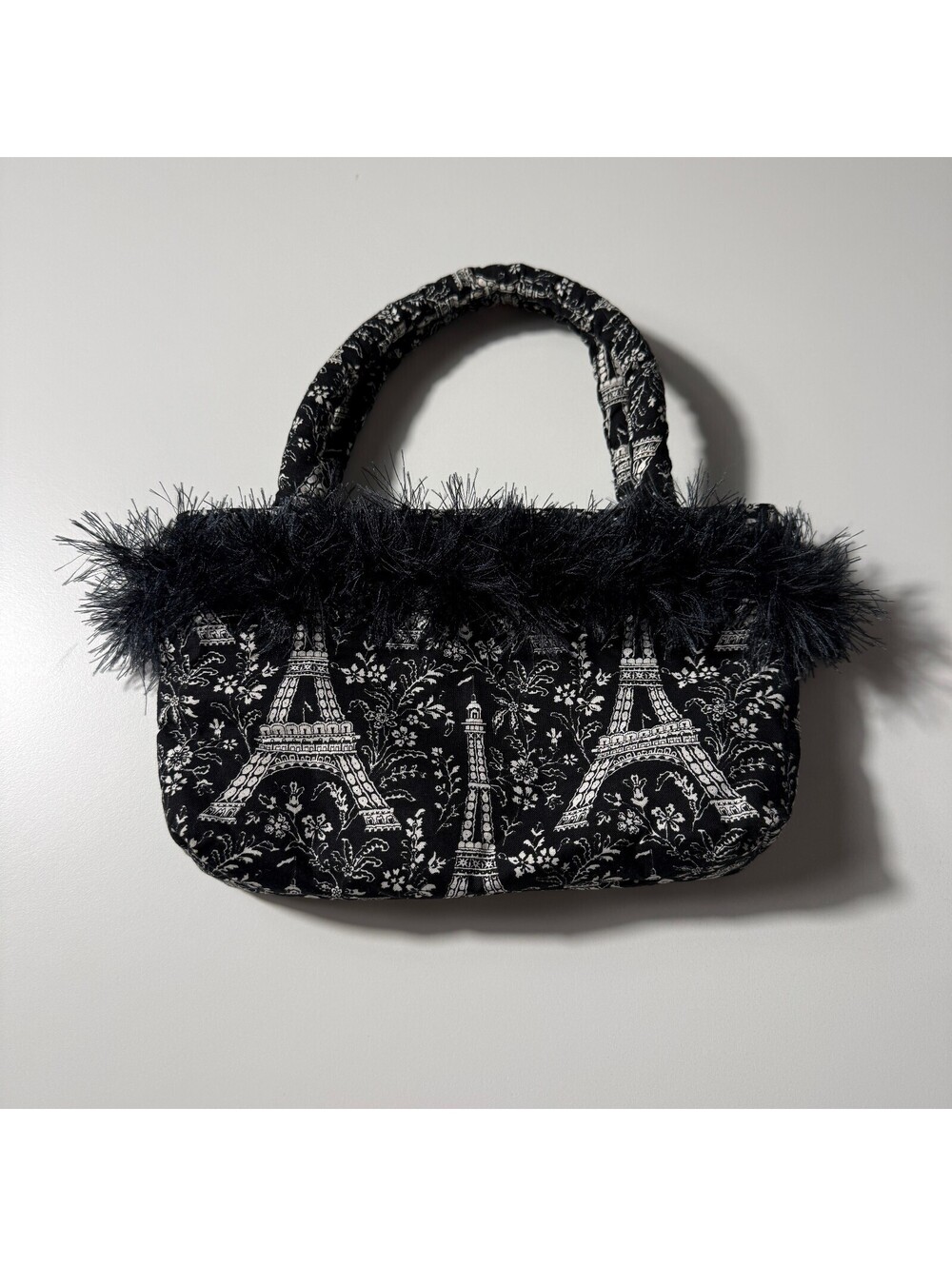 Y2K Inspired Black and White Eiffel Tower Print Handbag with Faux Feather Trim